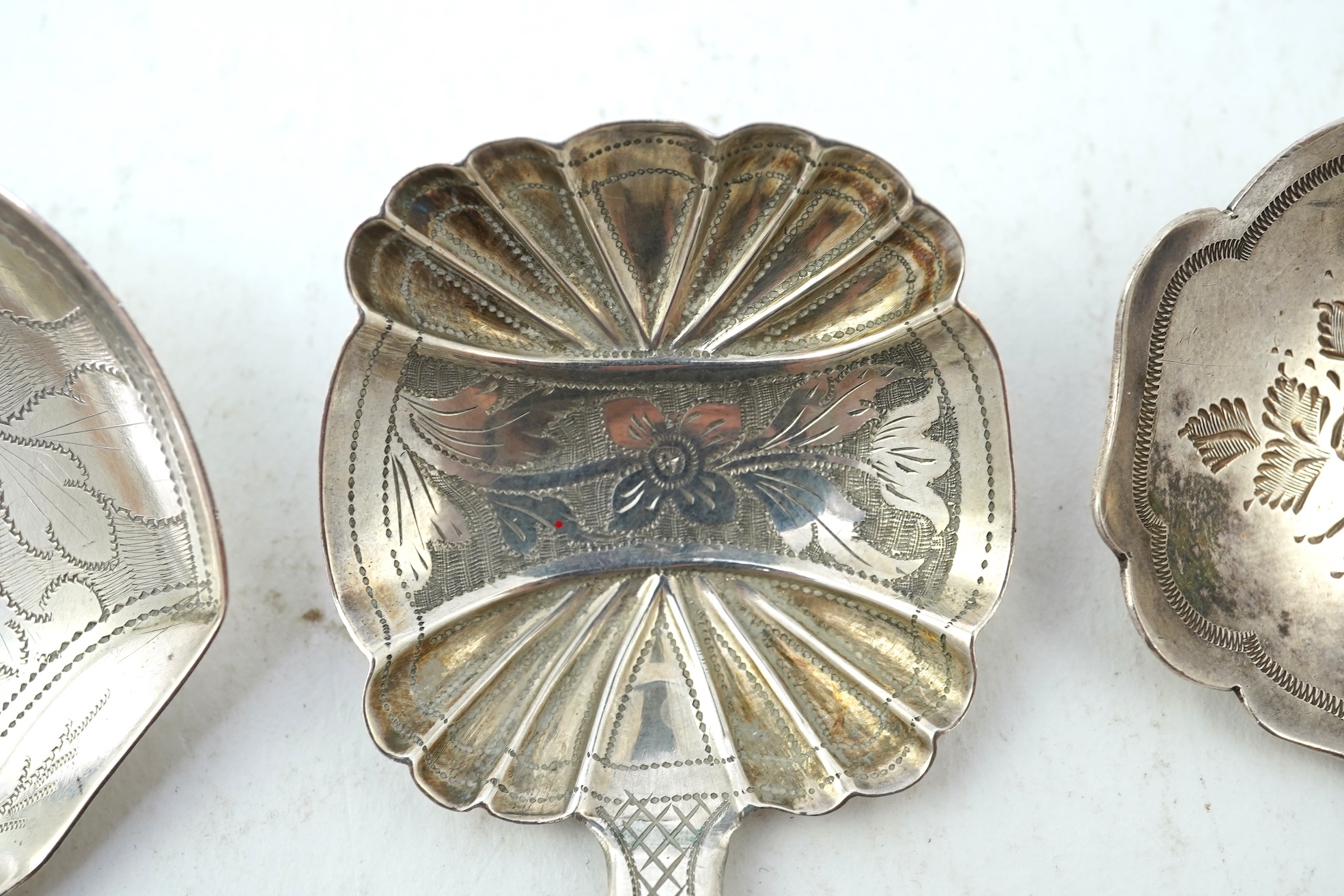 Ten assorted manly 19th century silver caddy spoons